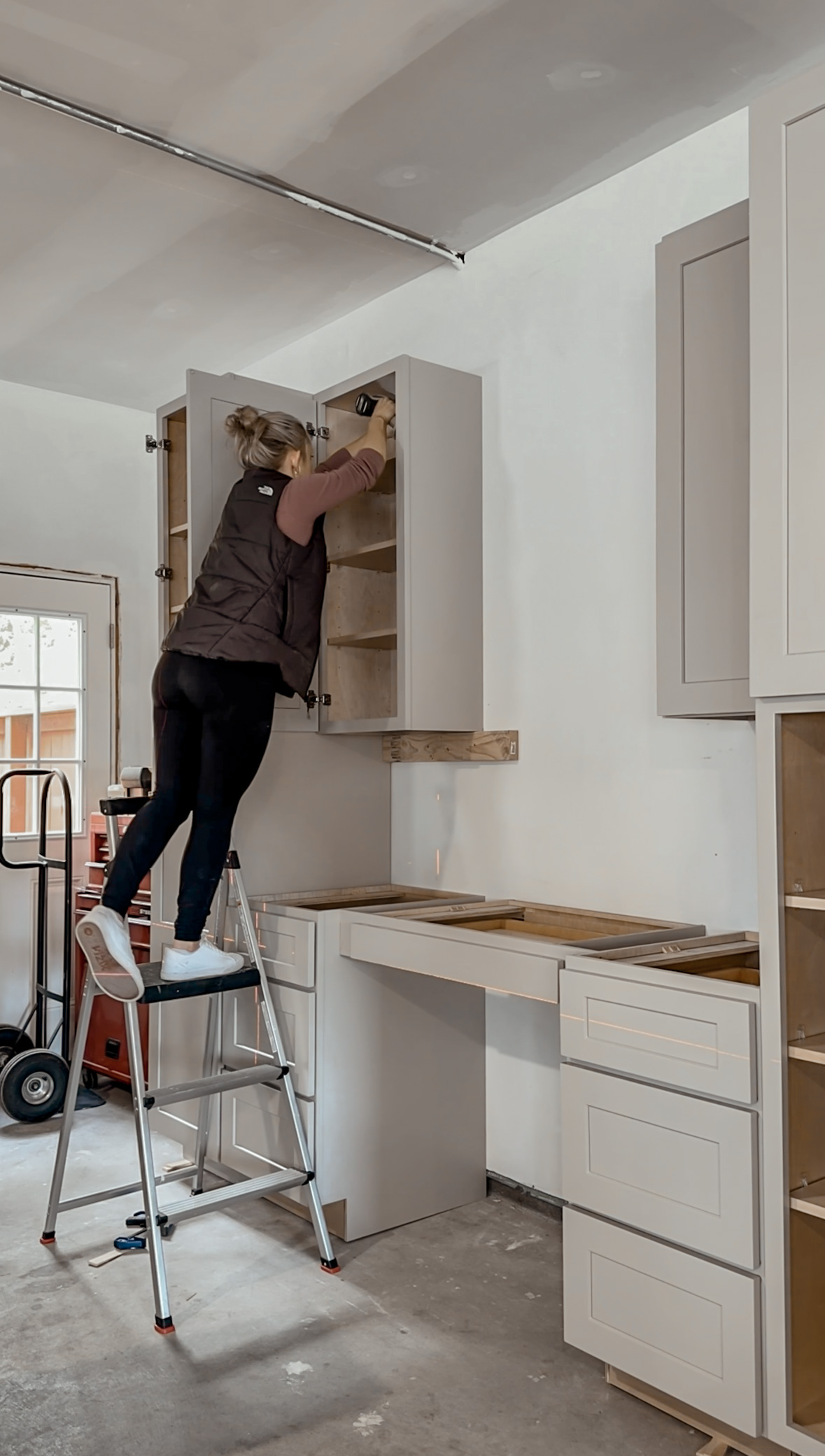 How To Hang Wall Cabinets By Yourself How to Hang Wall Cabinets by Yourself - Come Stay Awhile by Amanda